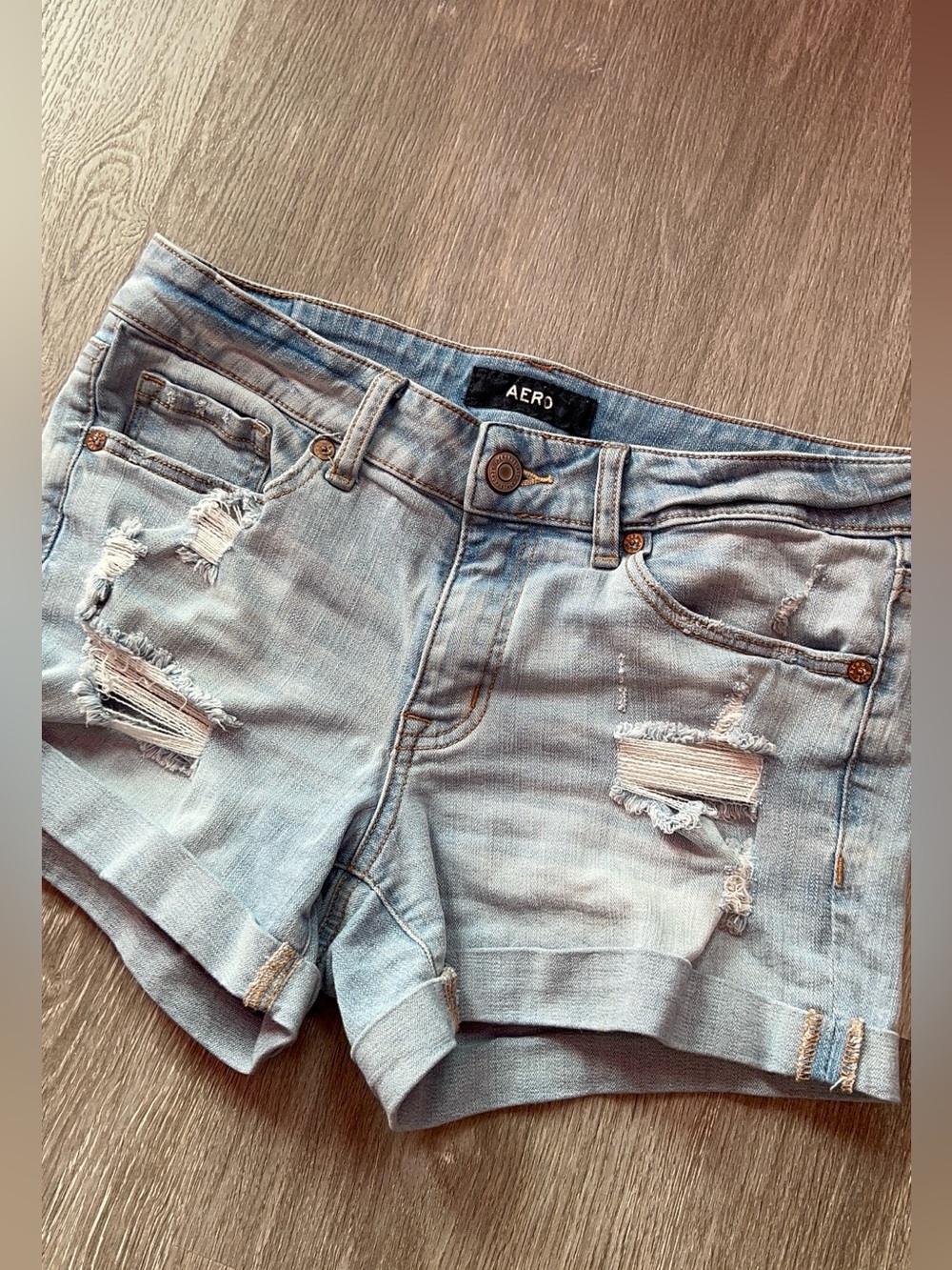 Aero High-Rise Light Blue Distressed Denim Cutoff Shorts